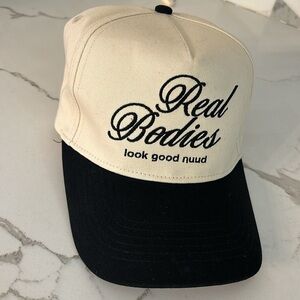 NUUDS REAL BODIES HAT NEW Cream and Black adjustable snap back
